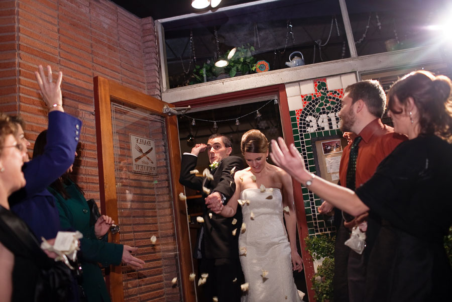 fun clever wedding reception at the daily review cafe in houston photographed by wedding photographer table4 weddings