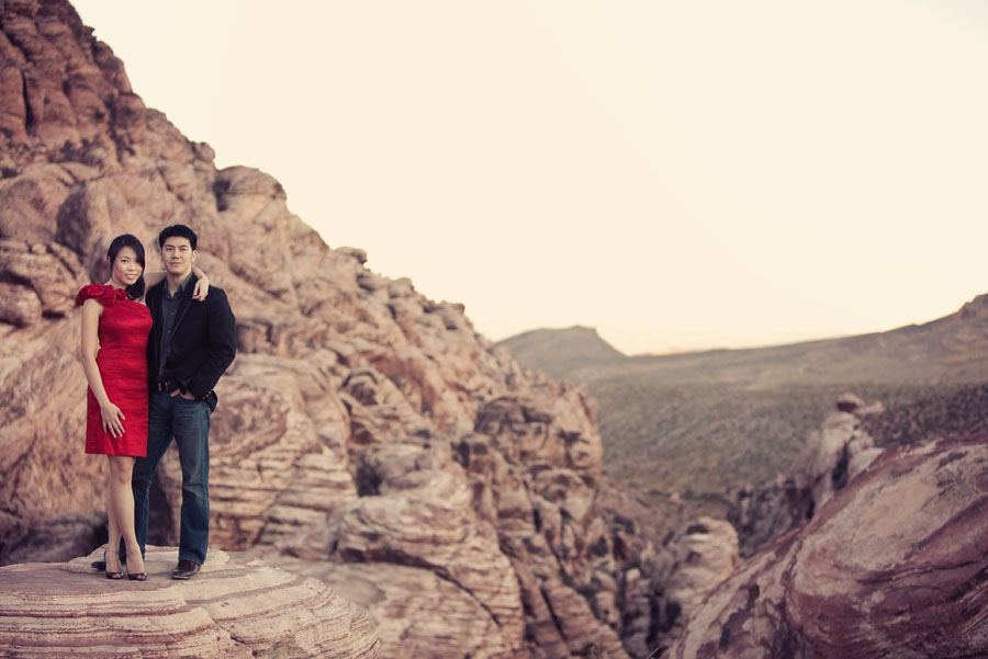 fun drama induced night time engagement images at red rock canyon in las vegas photographed by table4 weddings