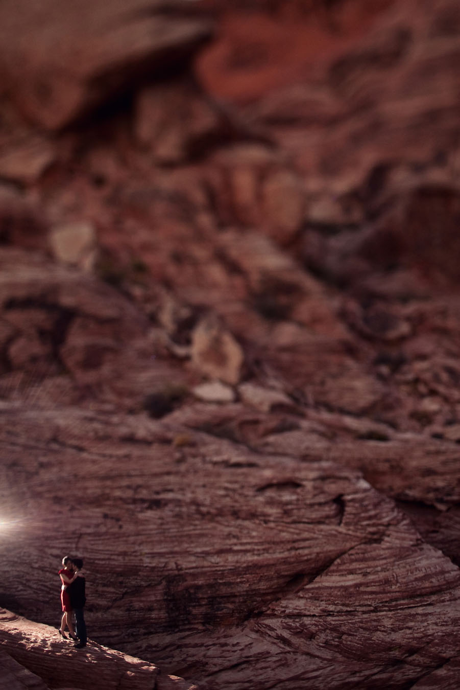 fun drama induced night time engagement images at red rock canyon in las vegas photographed by table4 weddings