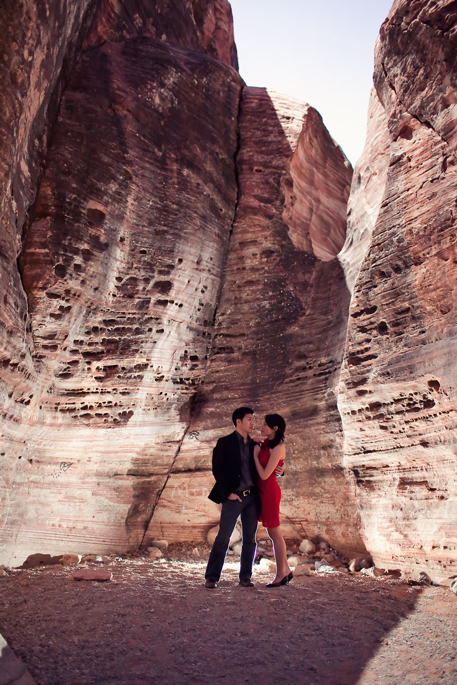 fun drama induced night time engagement images at red rock canyon in las vegas photographed by table4 weddings