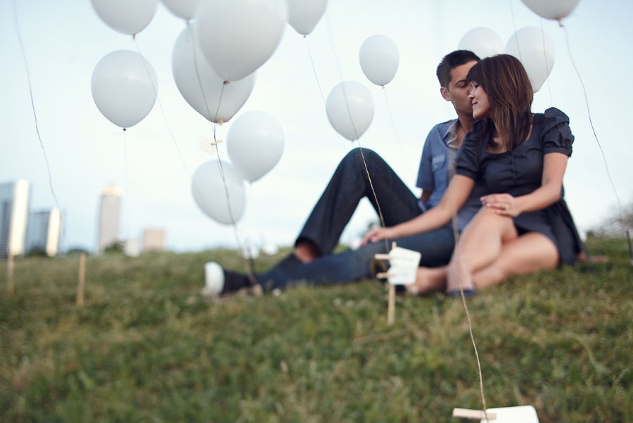 fun creative engagement session with white balloons by dallas wedding photographer table4