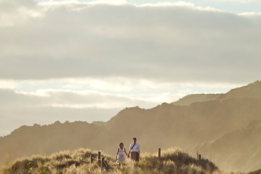 piha beach, auckland new zealand engagement photo