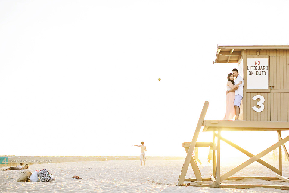 orange county beach life guard tower engagement photography