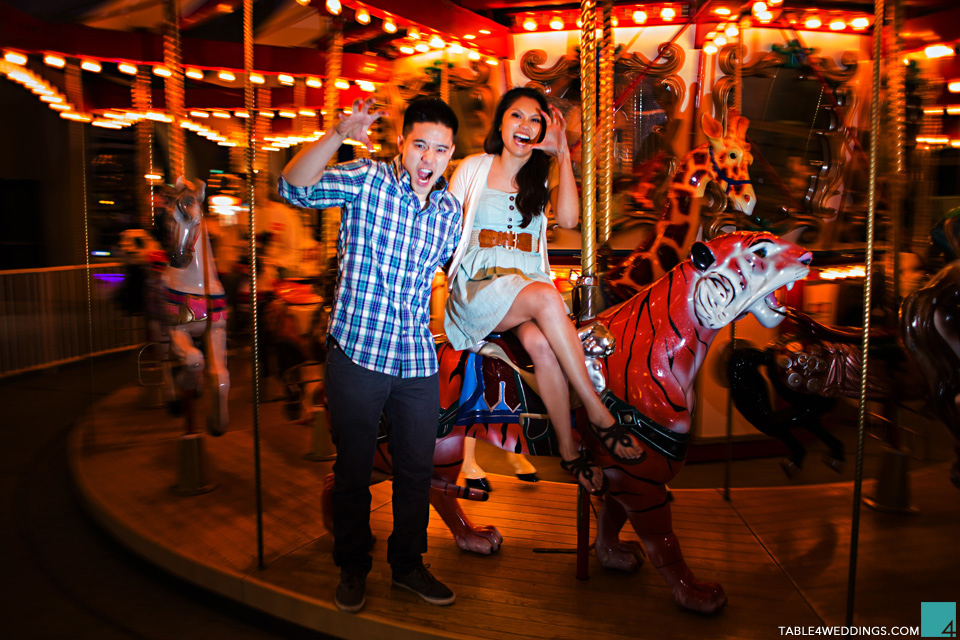 seattle seahawks fans at belmont park san diego carnival games engagement photo by wedding photographer jason huang table4 weddings